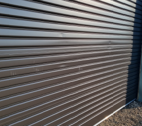 4200mm high x 4040mm Garador Commercial Roller Door Ironsand - DAMAGED - WINDLOCKED - AVAILABLE IMMEDIATELY